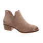 The Talita-3 Ankle Bootie by OLEM SHOE CORP features a tan faux suede design with a low stacked heel, almond toe, side cutout, and elastic gore panel.