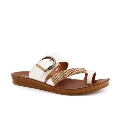 Discover the Bria Sandals by Los Cabos: crafted in white leather with elegant dual straps—one broad with an antique buckle and one slim. They feature a brown cushioned footbed and textured sole, combining style and comfort for daily wear.