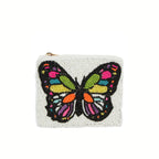 The Wona Trading Seed Bead Accented Mini Pouch Bag Assorted features stylish white beads and a vibrant butterfly, making it a chic coin pouch or thoughtful gift for fashionistas.