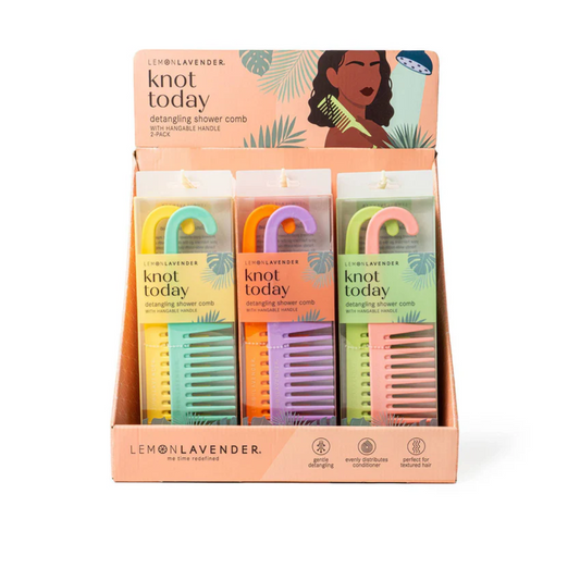 Display of three vibrant DM MERCHANDISING INC Knot Today Detangling Combs, available in assorted colors with lively packaging in yellow, orange, and pink by Lemon Lavender.