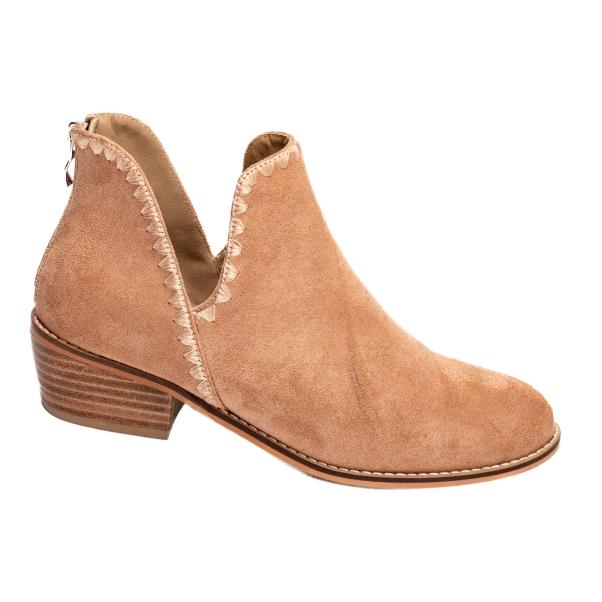 The Spice It Up Boot in Camel by Corky's from CORKY'S FOOTWEAR INC showcases a synthetic upper with a unique open ankle design, complemented by a low wooden block heel and elegant scalloped stitching along the seams.