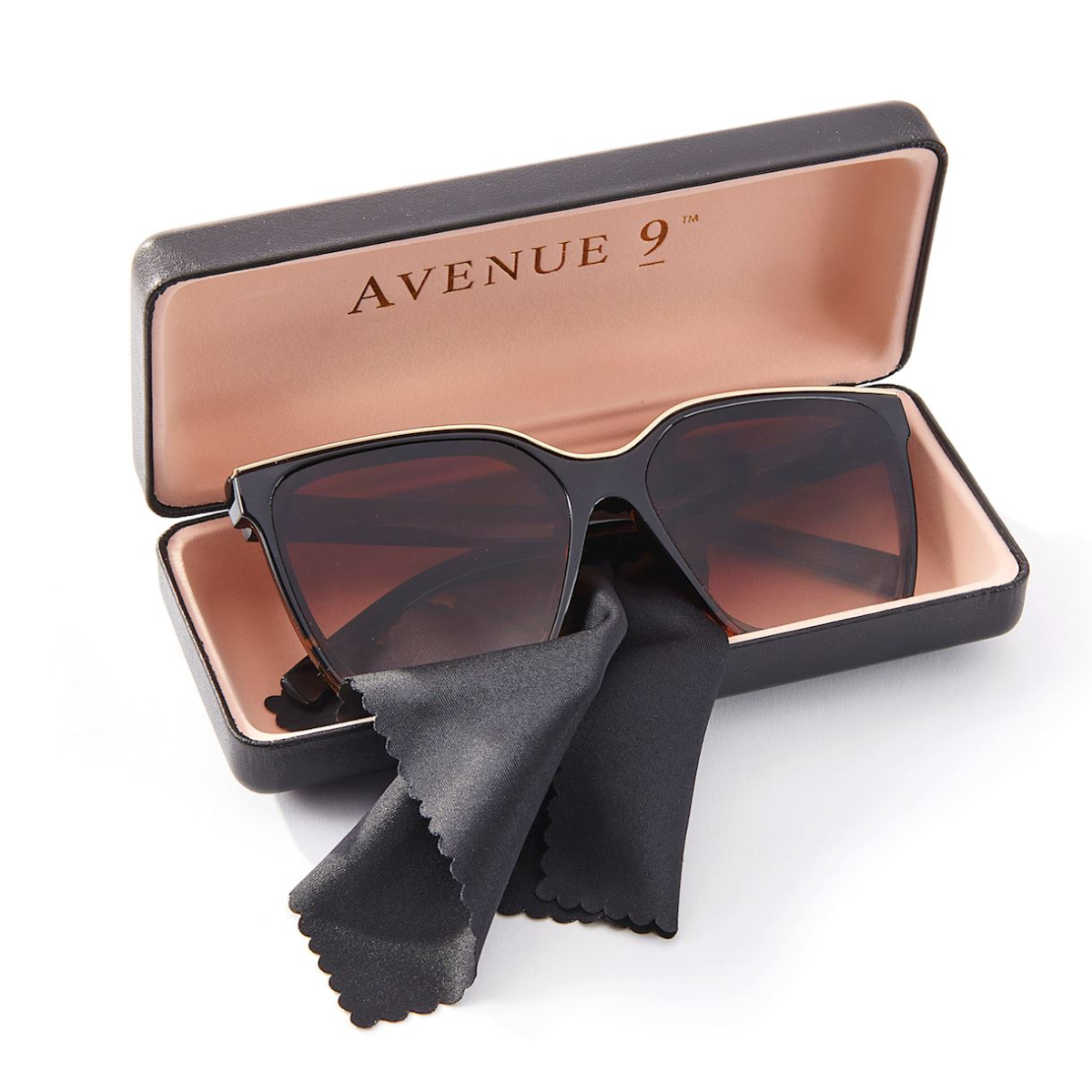 Women's trendy oversized sunglasses, presented in a rectangular Avenue 9 case from GIFTCRAFT, available in assorted colors. Complete with a black cleaning cloth, these stylish shades are the perfect accessory for any outfit.