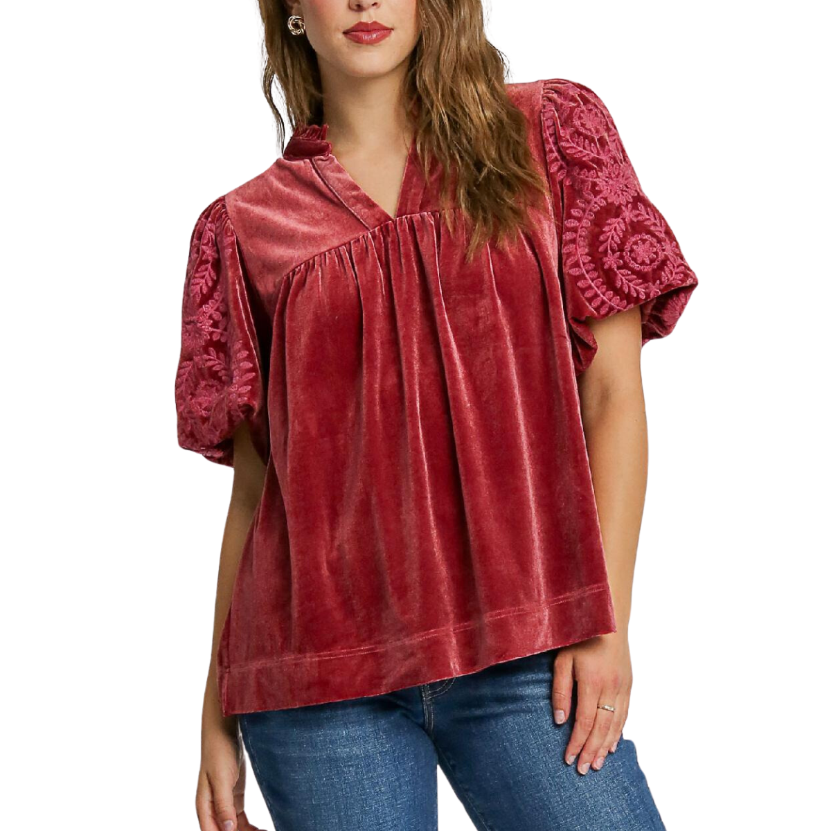 A person wearing the Velvet Embroidered Sleeve Top in Rosewood by Umgee, standing against a white background.