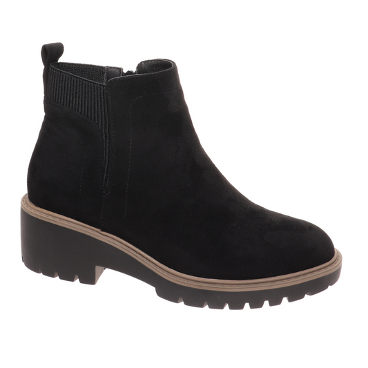 The Danielle-5 Boot in Black by Pierre Dumas from OLEM SHOE CORP is a black ankle boot with a chunky sole and a small heel, featuring a cushioned footbed for added comfort. It has a side zipper, an elastic section near the ankle, and is perfect for all-day wear.