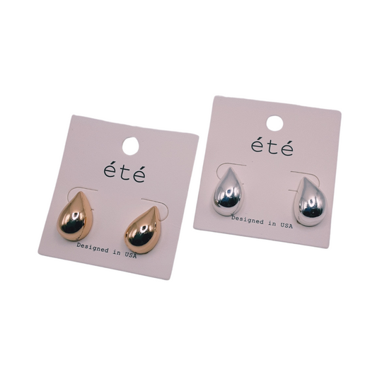 Gold and silver Teardrop Stud Earrings on white cards labeled "SPECIAL EFFECTS," designed in the USA.