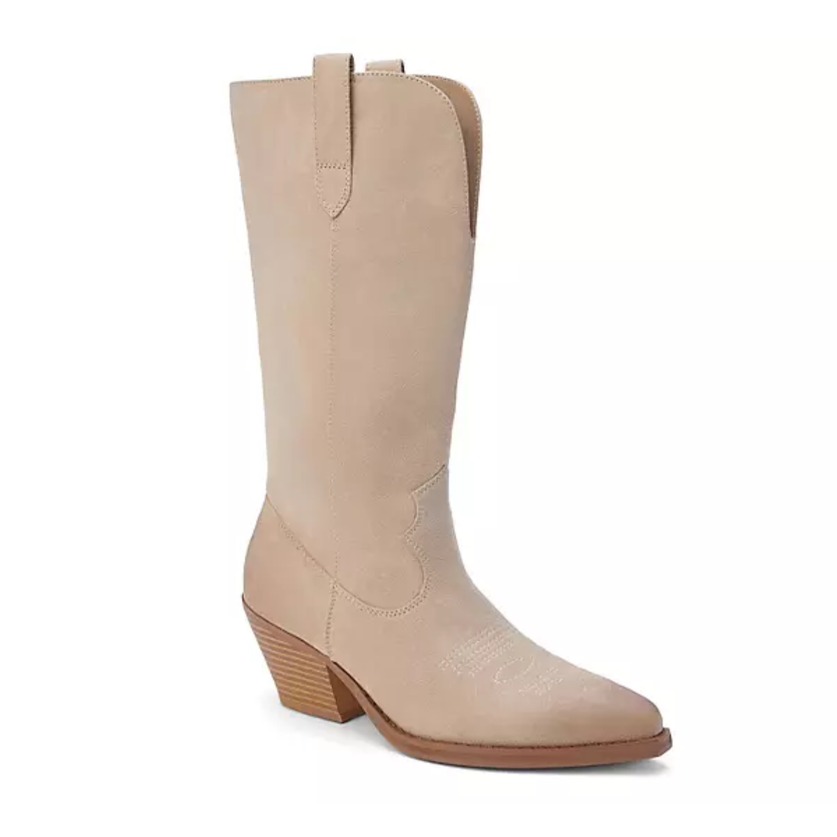 The Bodhi Western Cowboy Boot in Beige by Matisse is a beige boot made from faux suede, featuring a mid-height block heel and decorative stitching on the toe.