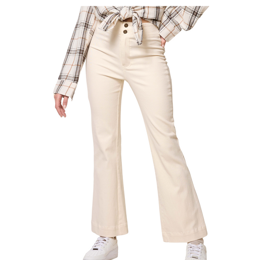 Person wearing the Soft Washed High Waisted Wide Flare Pants in Ivory by FASHION GO, paired with a plaid shirt tied at the waist and white sneakers.