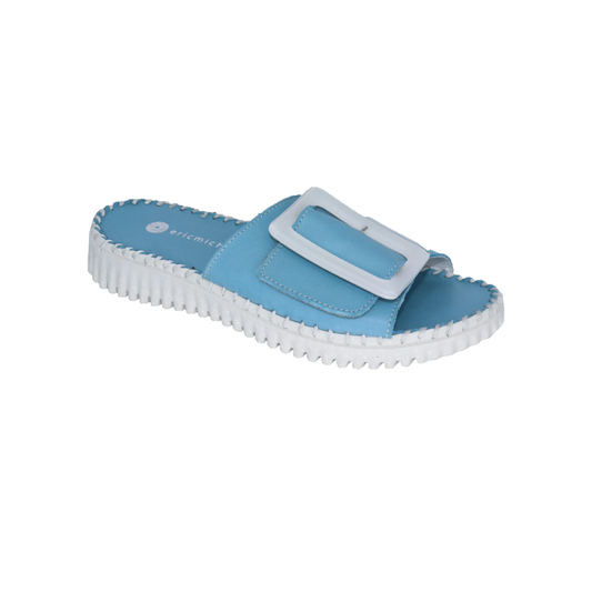 The Darla Leather Slide in Blue by Laurevan Shoe Corp boasts a soft leather upper, blue open-toe design, white buckle, and ridged sole. Crafted in Italy for comfort and style.