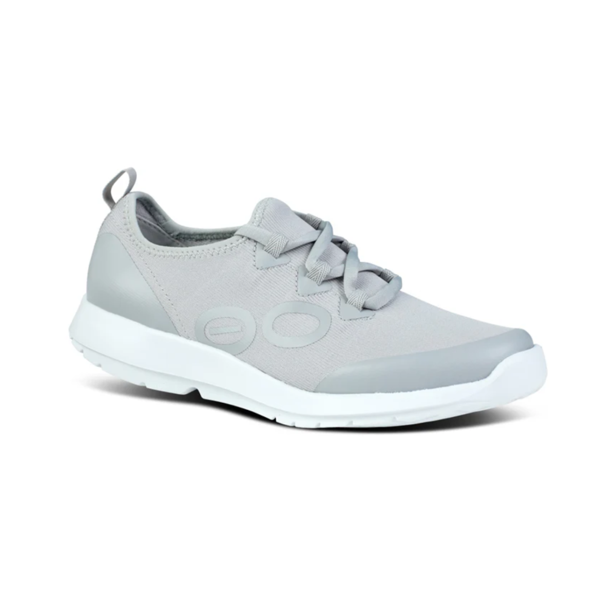 The Women's OOmg Sport LS in Slate by OOFOS, a gray athletic shoe with a white sole and looped laces ideal for active recovery, is presented on a plain white background. Featuring OOFOS LLC's OOfoam technology, it offers superior comfort and support.