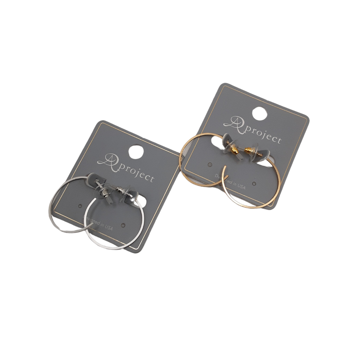 Two pairs of SPECIAL EFFECTS Thin Wire Hoop Earrings on gray cardboard backings—one pair is silver and the other is gold. Main image