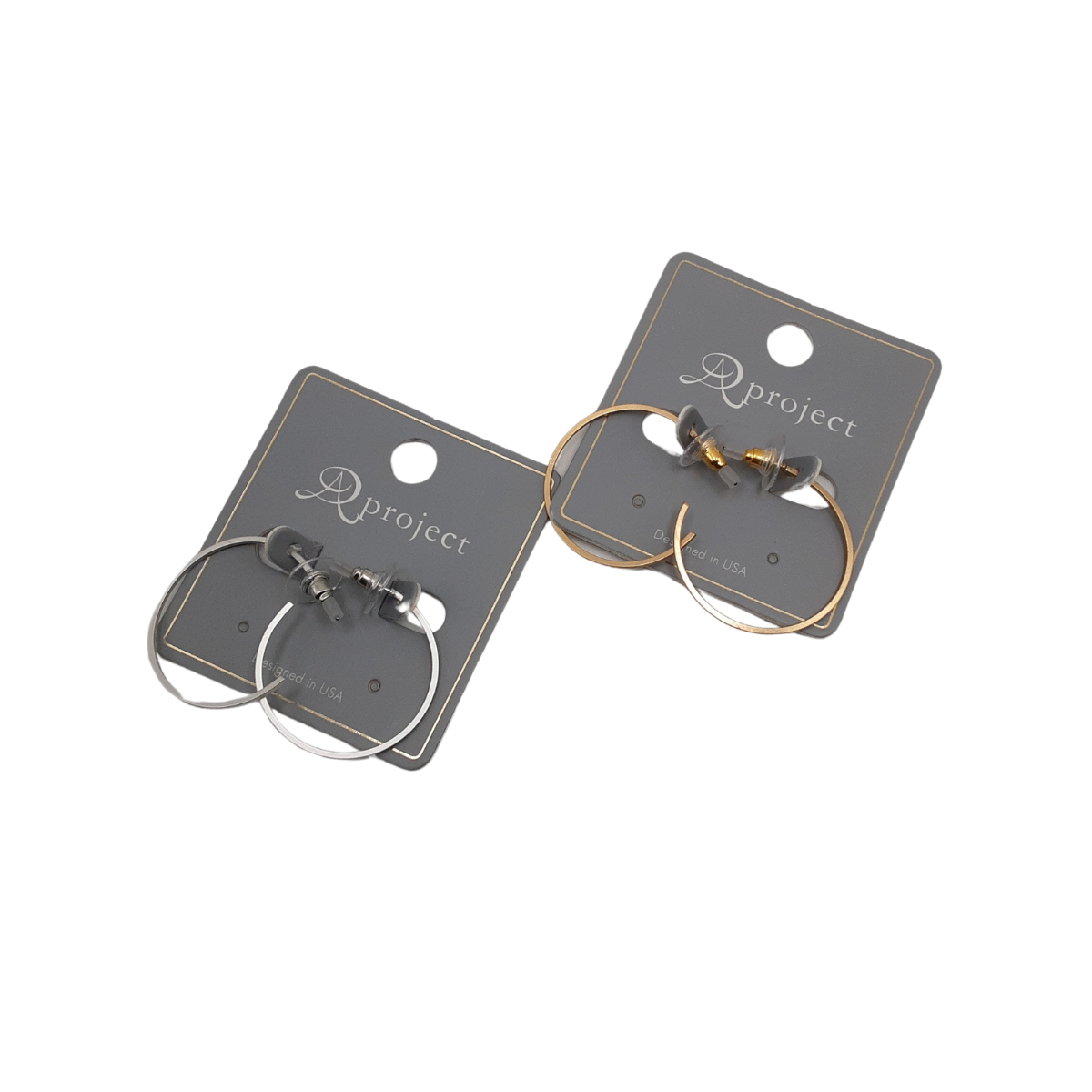 Two pairs of SPECIAL EFFECTS Thin Wire Hoop Earrings on gray cardboard backings—one pair is silver and the other is gold.