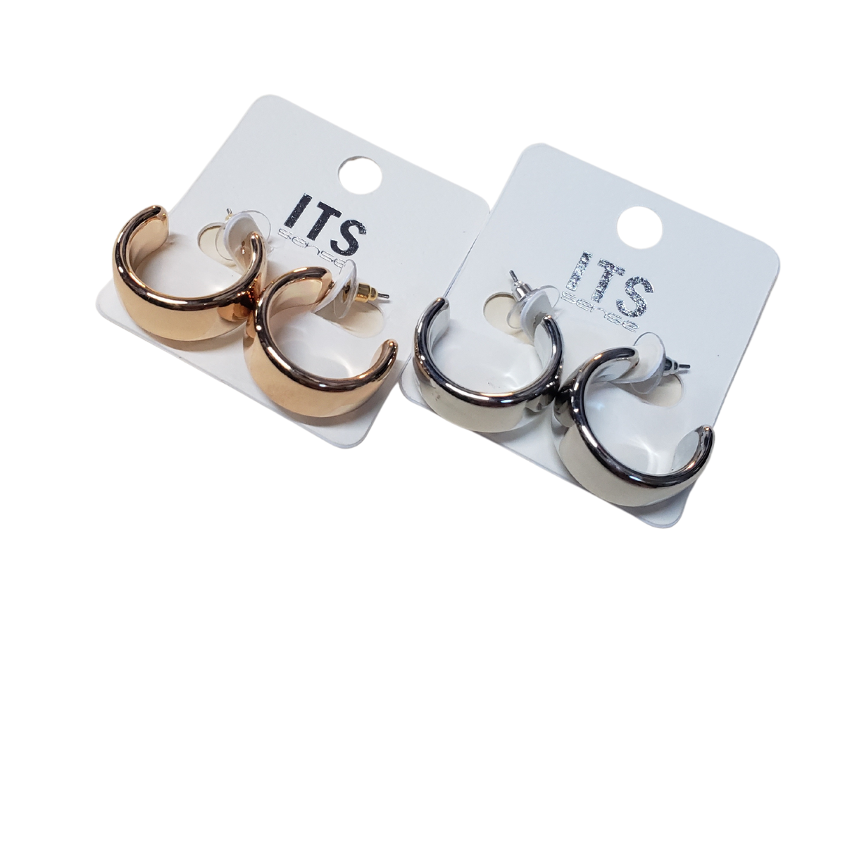 Two pairs of SPECIAL EFFECTS Wide 20 mm Hoop Earrings on display cards, one in gold and one in silver. Main image