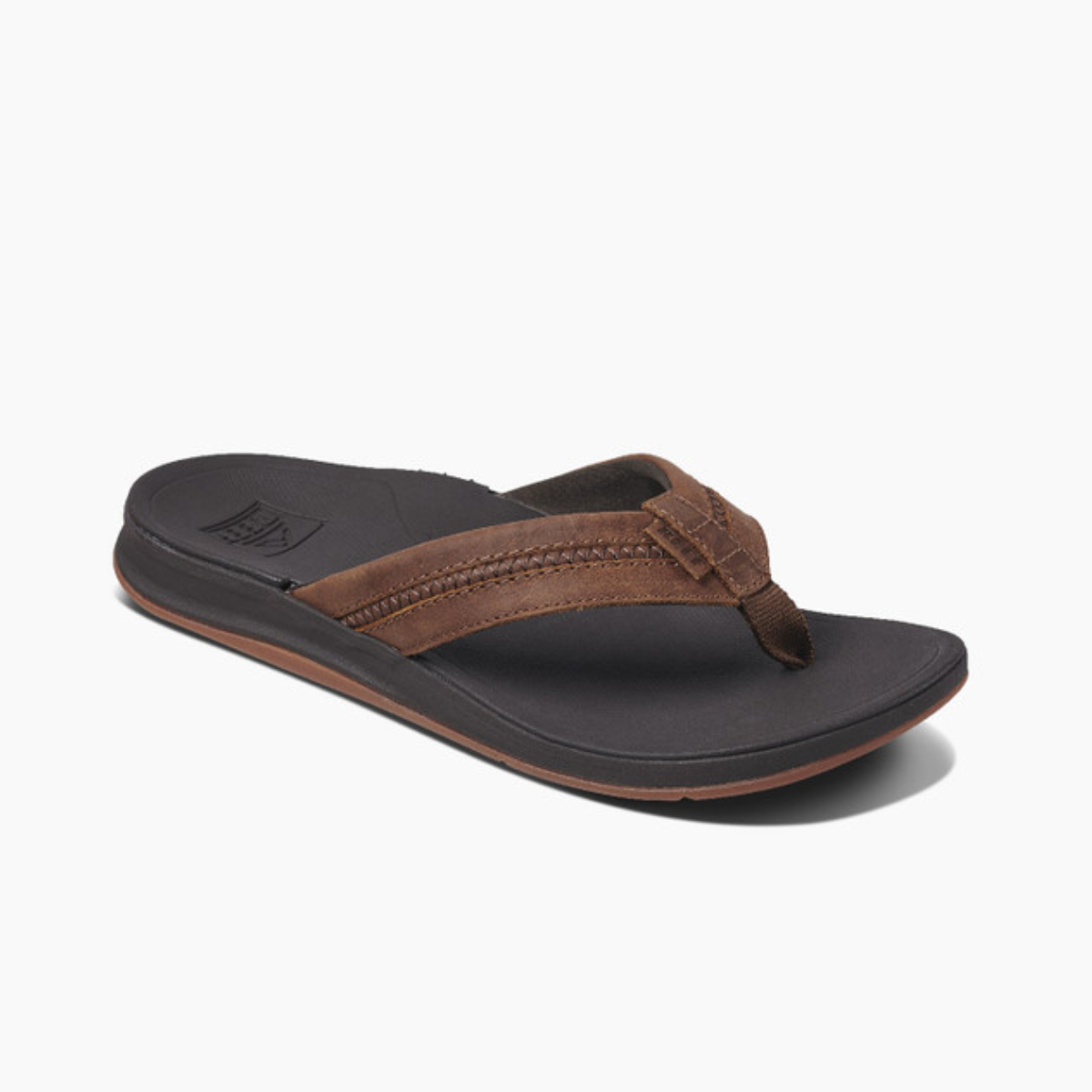 Introducing the Ortho Bounce Men's flip-flop in Brown by Reef, a stylish orthotic sandal featuring a black insole, wide strap, and thong design, displayed against a white background. Main image