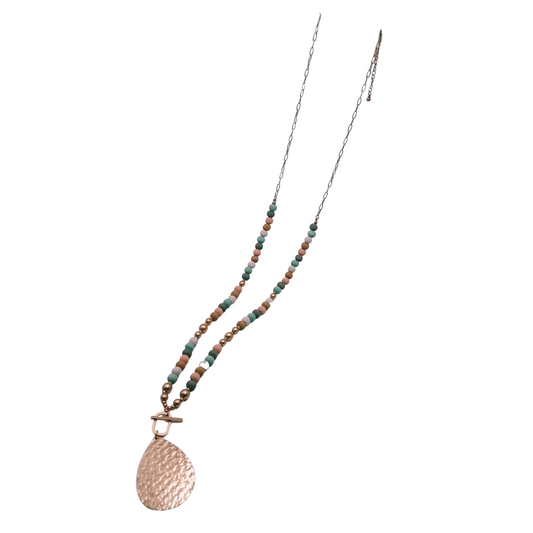 Teardrop Pendant with Wood Beads by SPECIAL EFFECTS, showcasing green, pink, and gold beads on a delicate chain.