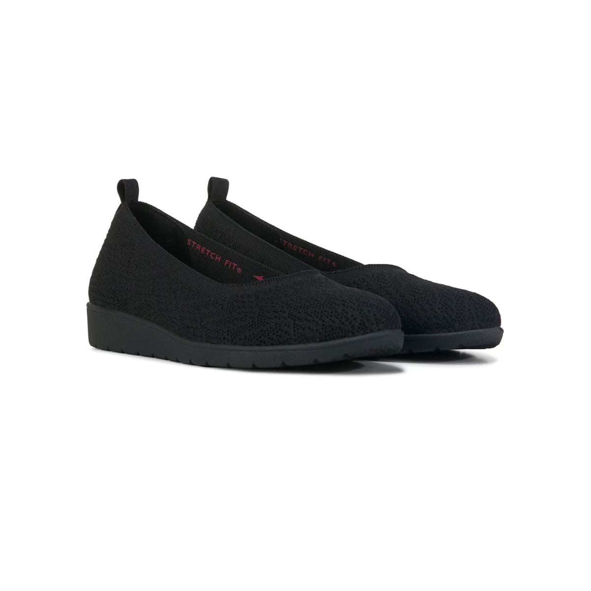 A pair of SKECHERS FLEX WEDGE BLACK shoes from SKECHERS USA INC, featuring a black, slip-on design with wedge heels, a textured fabric surface, and pull tabs at the back.