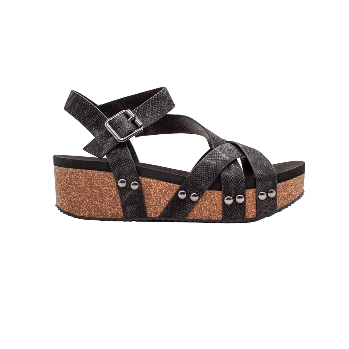 The Volatile - Rosenthal & Rosenthal Sandcastle Wedge in Black features a cork sole, ankle buckle, metal rivets, and cushioned footbed for all-day comfort, shown from the side on a white background.