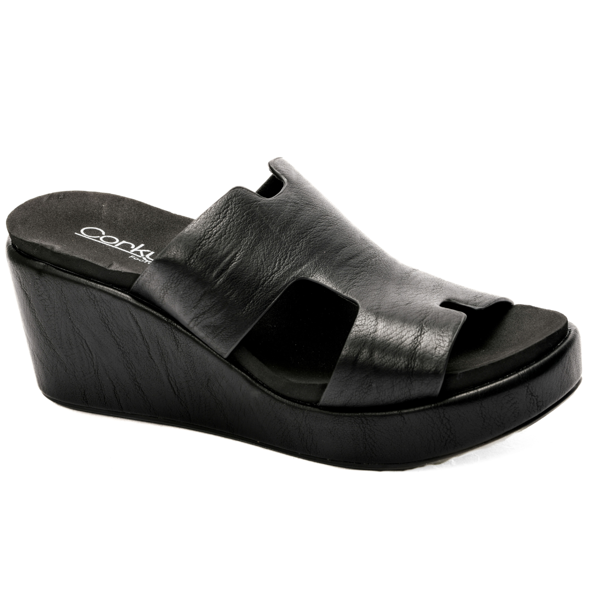 The Pucker Up Wedge in Black Smooth 2 by Corkys from CORKY'S FOOTWEAR INC are black leather sandals with a platform sole and open-toe design, featuring a cut-out upper and signature foam footbed for those seeking comfortable heels.