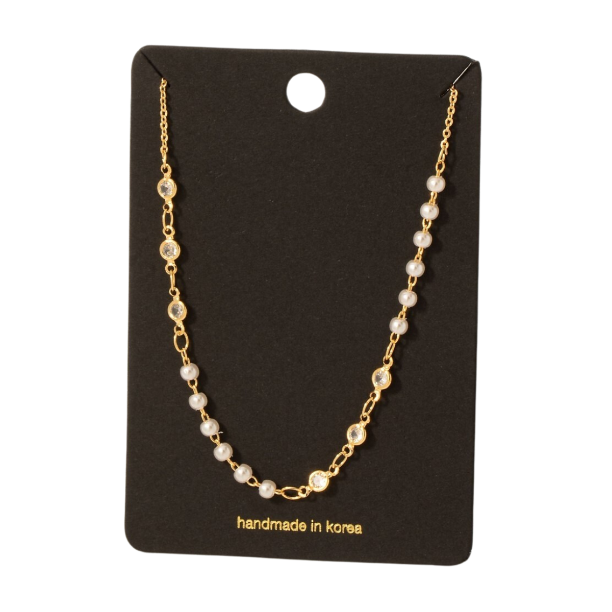 The CZ and Pearl Station Necklace by FASHION GO features a gold chain adorned with pearl stations and clear cubic zirconia gems, elegantly presented on a black card labeled "handmade in Korea. Main image