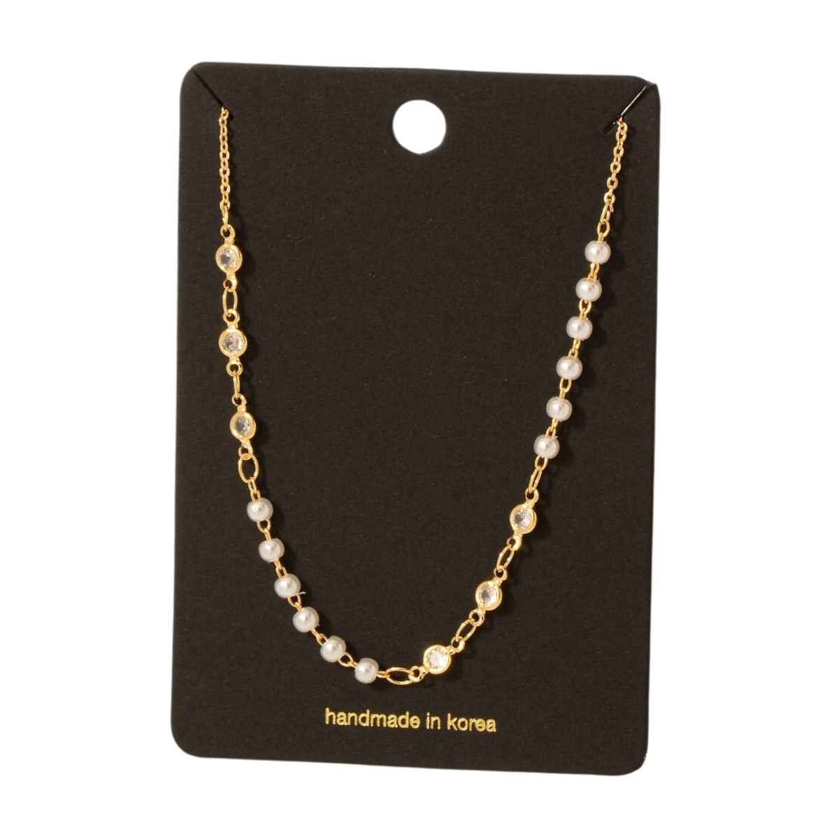 The CZ and Pearl Station Necklace by FASHION GO features a gold chain adorned with pearl stations and clear cubic zirconia gems, elegantly presented on a black card labeled "handmade in Korea.