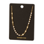 The CZ and Pearl Station Necklace by FASHION GO features a gold chain adorned with pearl stations and clear cubic zirconia gems, elegantly presented on a black card labeled "handmade in Korea.