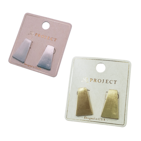 Two sets of Pyramid Shape Earrings, one silver and one gold, are showcased on display cards with the brand label "SPECIAL EFFECTS" and the tagline "Designed in U.S.A.