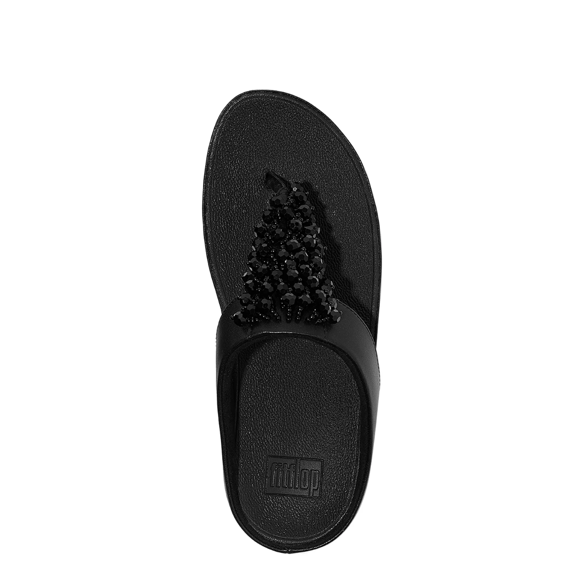 A single Rumba Beaded Toe Post Sandal by FITFLOP USA LLC is shown from above, featuring a flat sole, visible FitFlop branding, and stylish bead detailing on the strap.