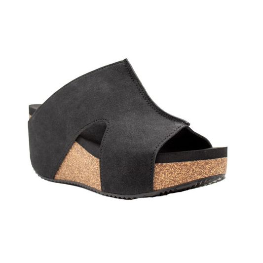 A black Cassat Faux Suede Slide With Cutouts Volatile in Black wedge sandal from Volatile - Rosenthal & Rosenthal, featuring a fashion-forward open toe, stylish cutouts, and a cork sole.