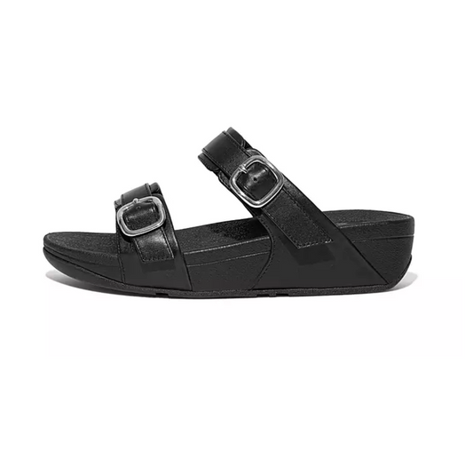 The FITFLOP USA LLC's FIT FLOP LULU ADJSTSLIDE/BLACK features two adjustable straps with silver buckles, a slight wedge heel, and a thick sole.