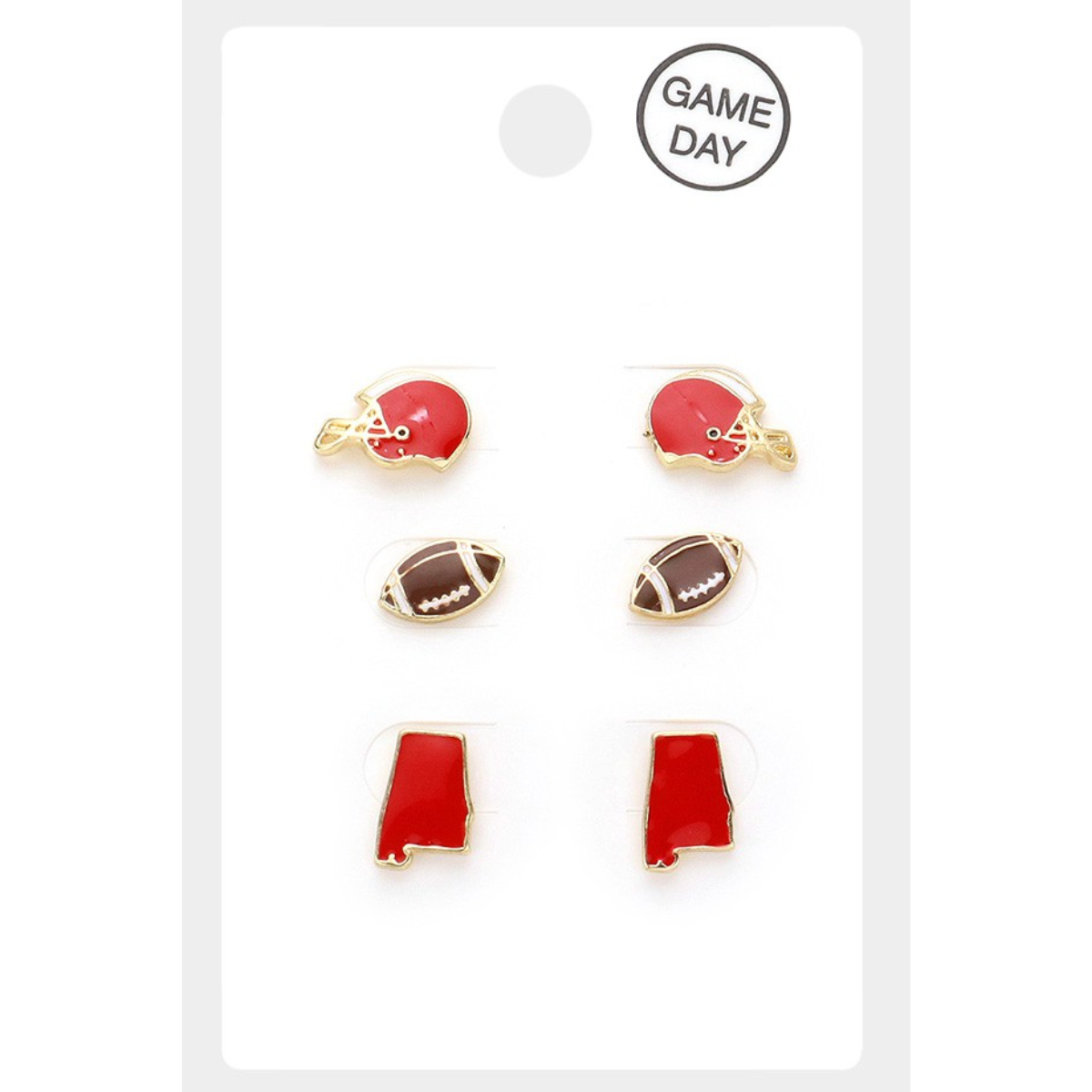 Introducing the "Game Day Stud Earrings - Red and White" by Wona Trading. This delightful set includes six football-themed stud earrings, displayed on a white card labeled "Game Day." The designs feature football helmets, footballs, and red state maps. These small earrings are perfect for showcasing your team spirit!