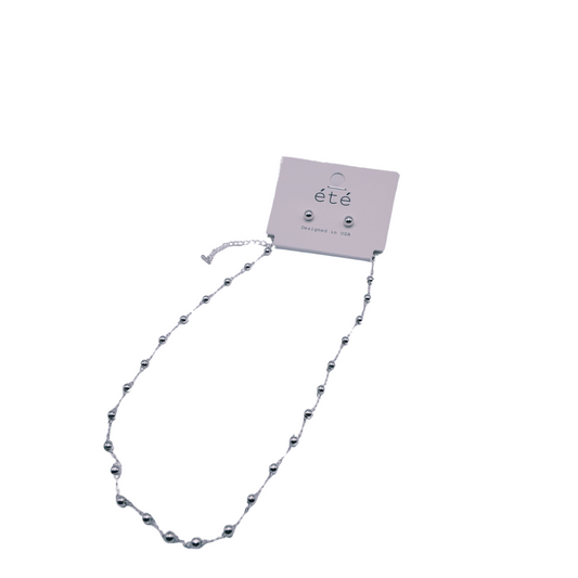 The 16" Silver 3mm Beads Set by SPECIAL EFFECTS is elegantly showcased on a display card marked "été.