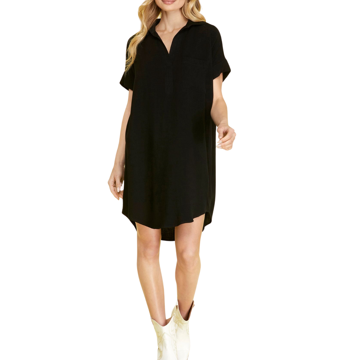 A person is wearing the She & Sky Short Sleeve Woven Shirt Dress in Black, featuring a V-neck collar and front pocket, paired with white ankle boots.