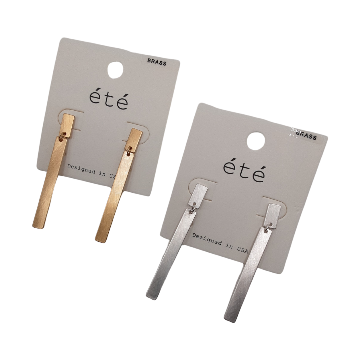 Two pairs of SPECIAL EFFECTS Rectangle Drop Earrings on display cards. One pair is gold-toned and the other silver-toned, both labeled "été" and "Designed in USA.