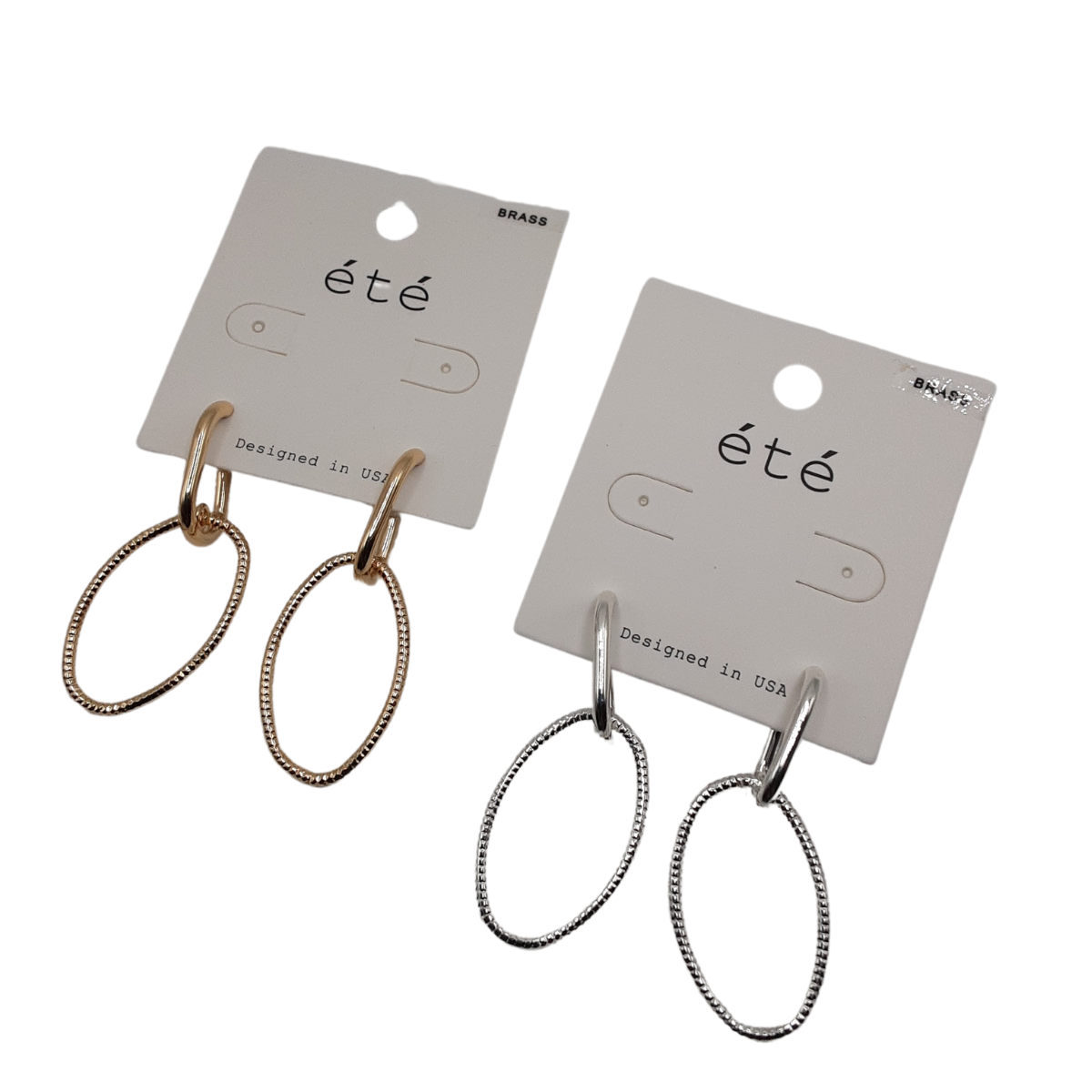 The product consists of two pairs of Oval Wire Hoop Earrings from SPECIAL EFFECTS, featuring one gold-toned pair and one silver-toned pair on cards, labeled "été" and marked as "Designed in USA. Main image