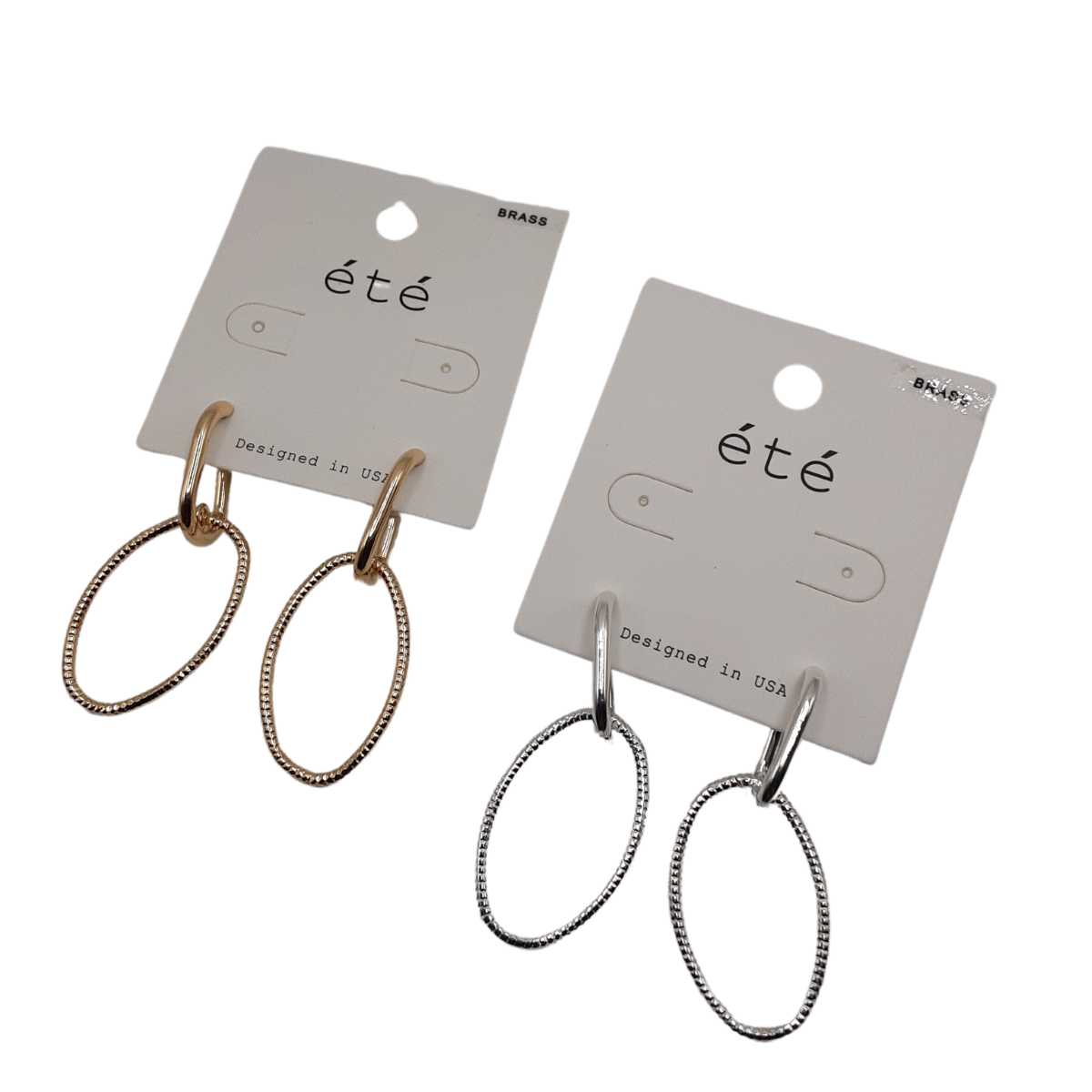 The product consists of two pairs of Oval Wire Hoop Earrings from SPECIAL EFFECTS, featuring one gold-toned pair and one silver-toned pair on cards, labeled "été" and marked as "Designed in USA.