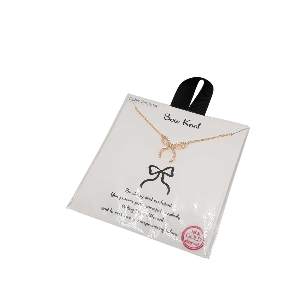 A captivating 16" Bow Necklace from SPECIAL EFFECTS, featuring cubic zirconia embellishments, gracefully displayed on a white card with black ribbon and labeled "18K Gold Plated. Main image