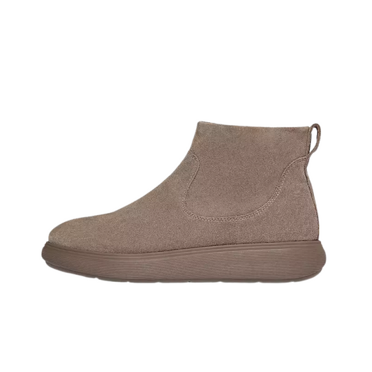 Side view of the iQ-COMFF Suede Zip Ankle Boots in Taupe by Fit Flops, featuring a round toe, heel pull tab, thick brown rubber sole, zip closure, and cushioned iQushion midsole for comfort—stylish suede ankle boots by Fit Flops.
