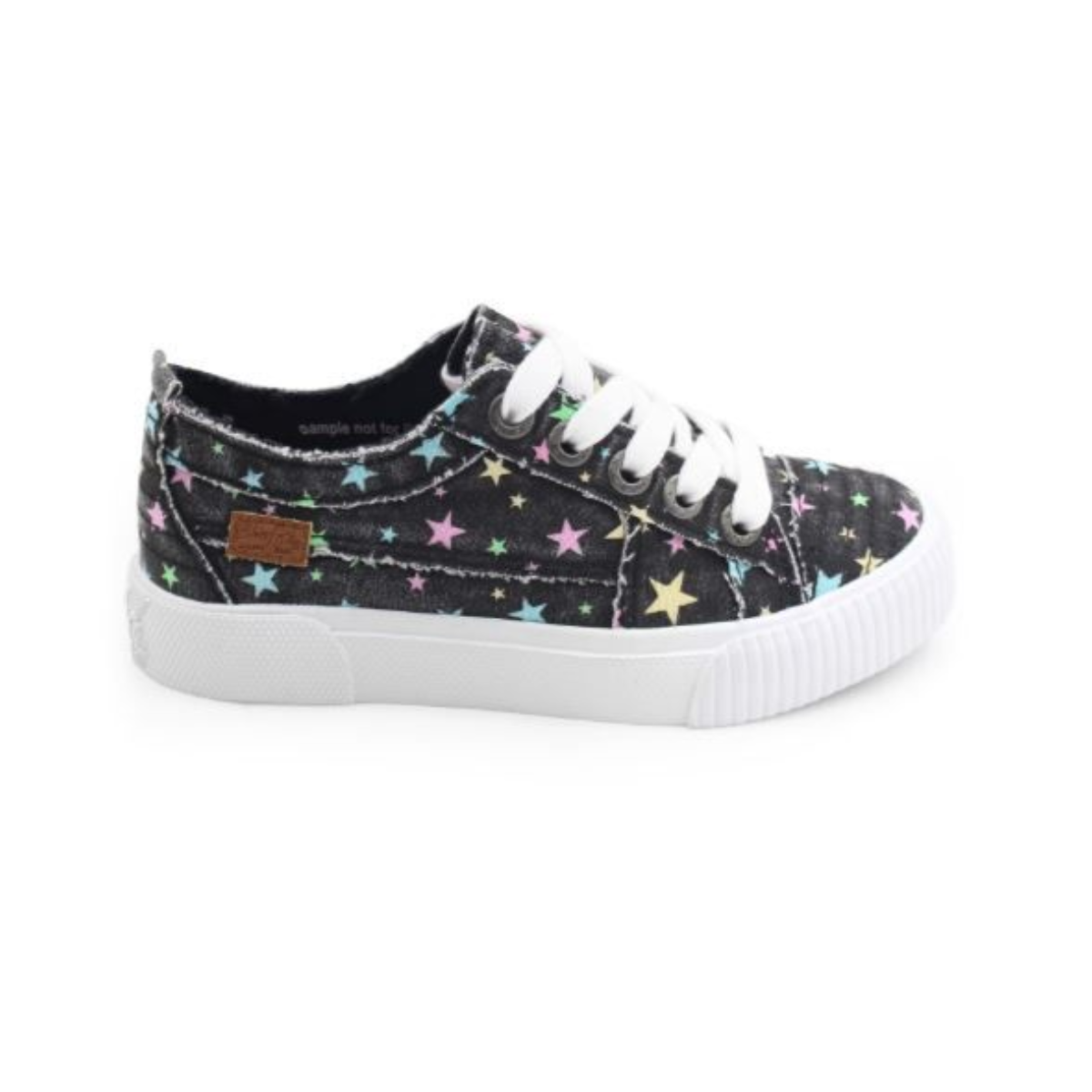The Blowfish Multi Star Dazzle Clay Kids Sneakers by BLOWFISH feature a black design with white soles, functional laces, a colorful star pattern, and cushioned footbed for ultimate comfort. Main image