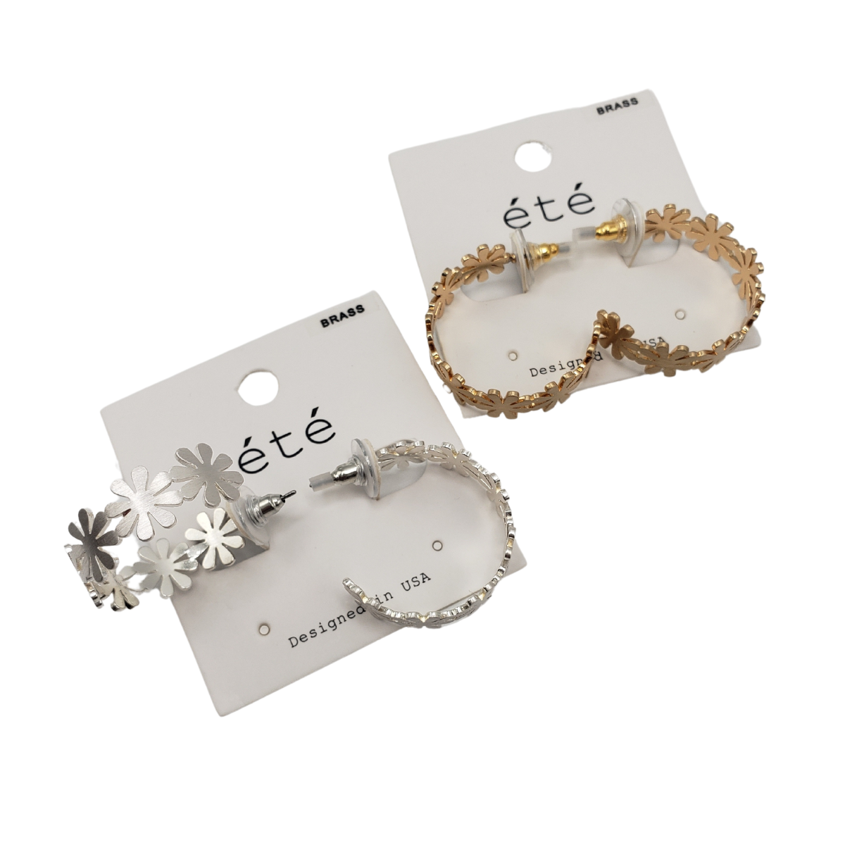 Two pairs of Flower Hoop Earrings elegantly rest on cards. One pair gleams in silver, the other in gold. Each card prominently features the brand name "SPECIAL EFFECTS. Main image
