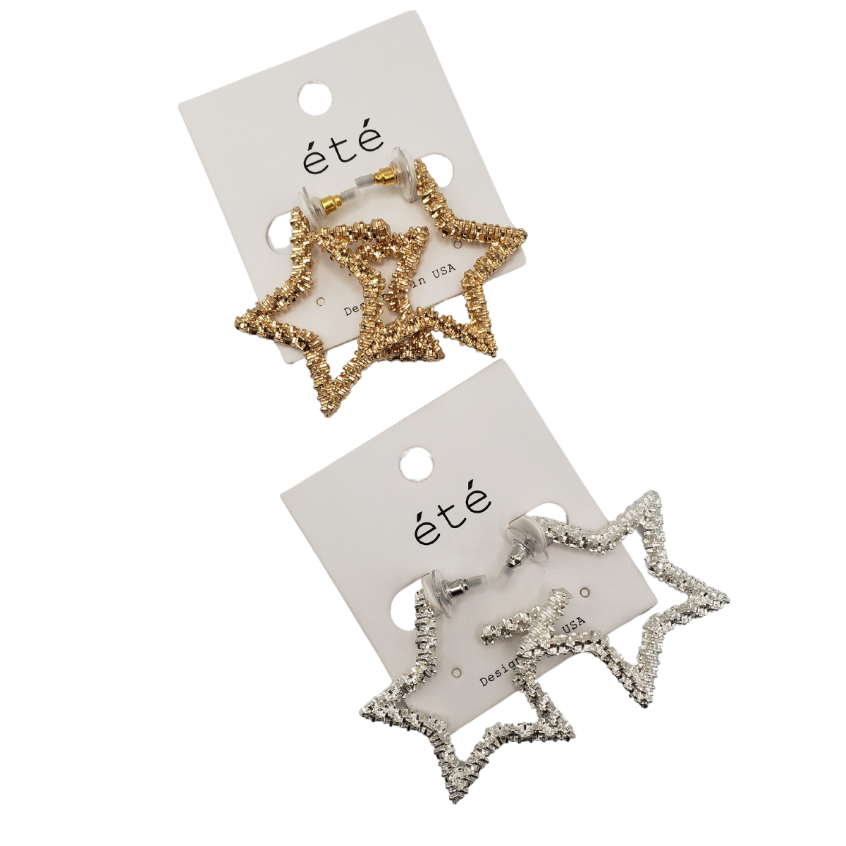 Two pairs of star-shaped earrings, one gold-toned and the other silver-toned, are attached to white cards displaying the brand name "SPECIAL EFFECTS" and the product name "Sparkle Star Earring.