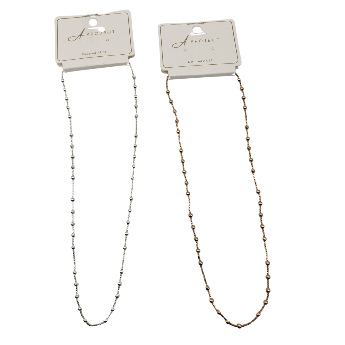 Two SPECIAL EFFECTS 16-inch Small Bead Station Necklaces on display cards: one gold-toned and one silver-toned, both showcasing small beads along the chain.