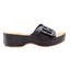 The Bertha Slide Sandal in Black by Volatile from PV Footwear is shown side-on against a white background, featuring a thick sole and an upper strap with a large tortoise shell buckle.