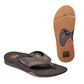 The Reef Fanning Men's Flip Flop in Brown Gum by REEF showcases anatomical arch support and textured soles, with the brand logo prominently displayed on the straps and bottom.