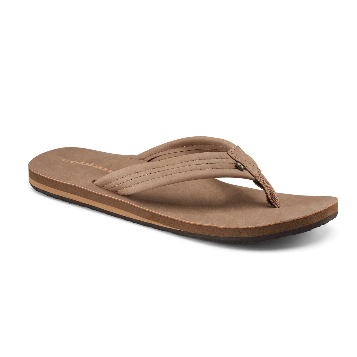 The COBIAN LASOLAS TAN, a beach sandal featuring a thick strap and flat sole, crafted from water-friendly synthetic leather, is showcased against a white background.