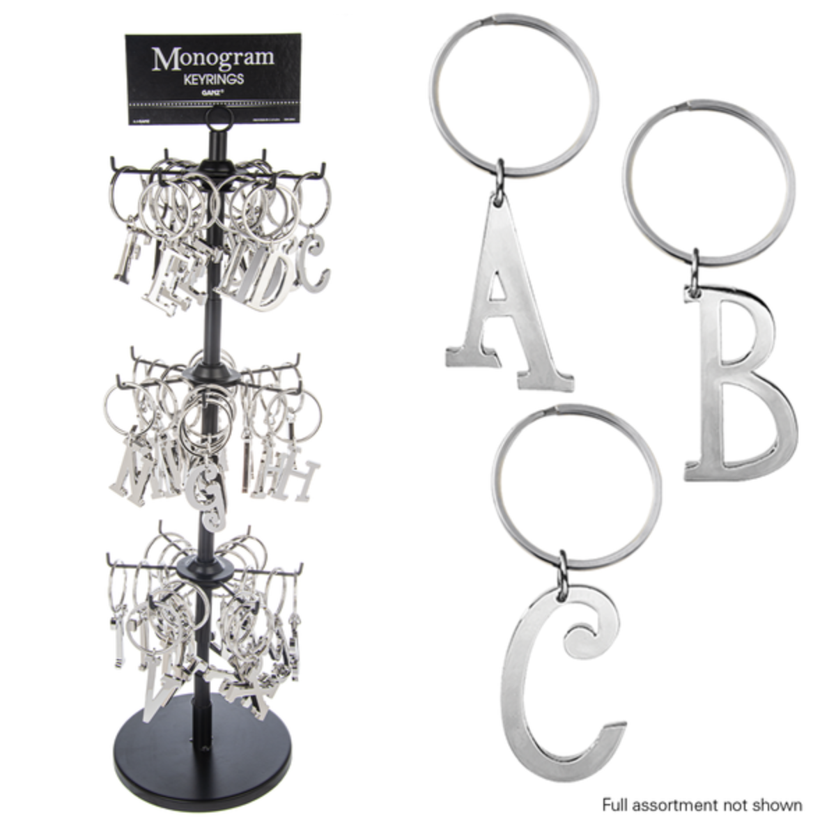 Ganz Inc's display stand features INITIAL KEY CHAIN items, showcasing metal keyrings shaped like the alphabet with separate displays for letters A, B, and C.