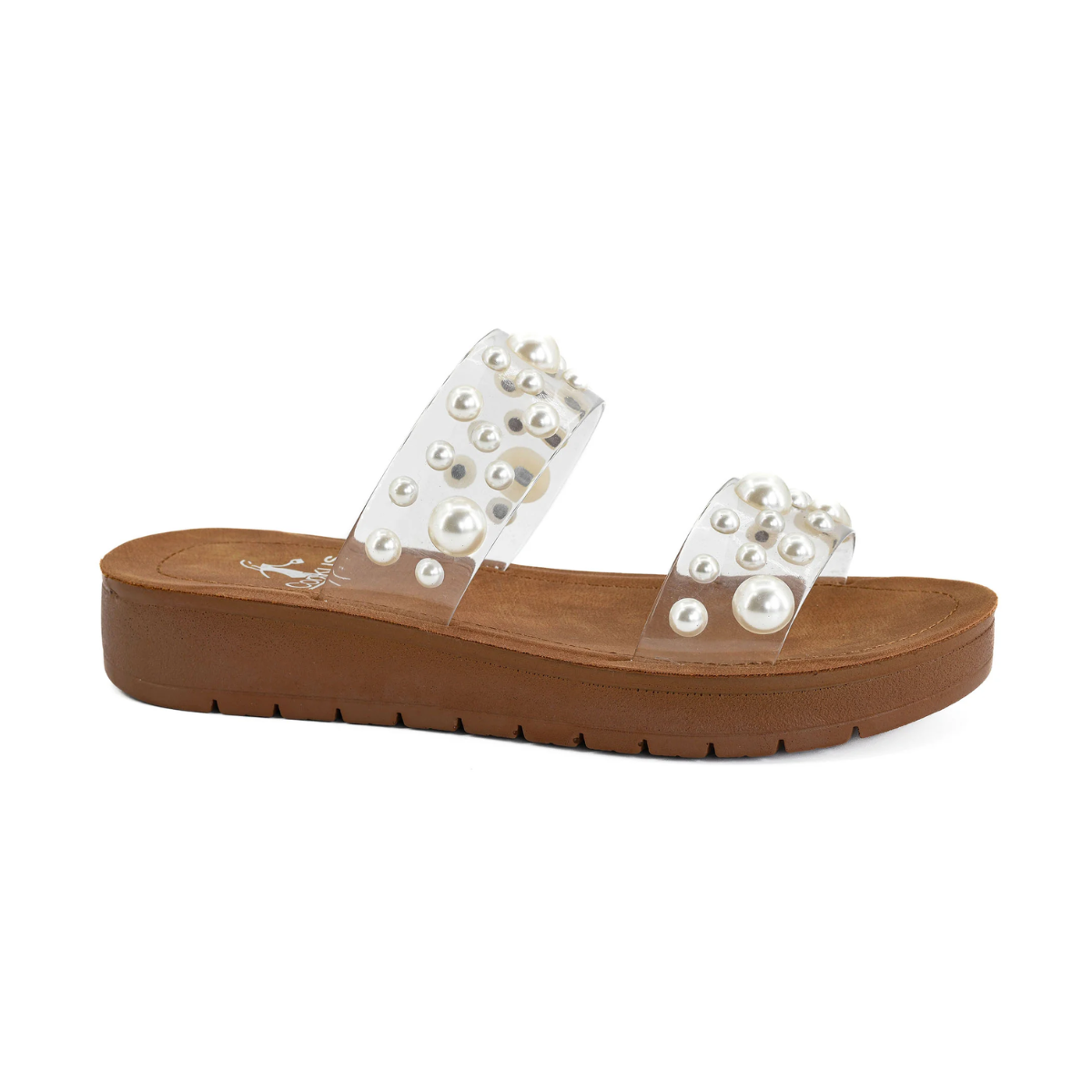 The Bad Romance Sandal by Corky's from CORKY'S FOOTWEAR INC is a slip-on with an edgy style, featuring clear straps with pearl embellishments and a brown sole for all-night comfort.