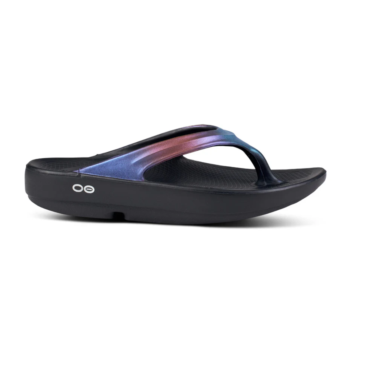 A side view of the OOFOS OOLALA MAGENTA SKY recovery sandal by OOFOS LLC, featuring a thick sole and stylish two-tone purple and pink straps, perfect for everyday wear with a feminine silhouette.