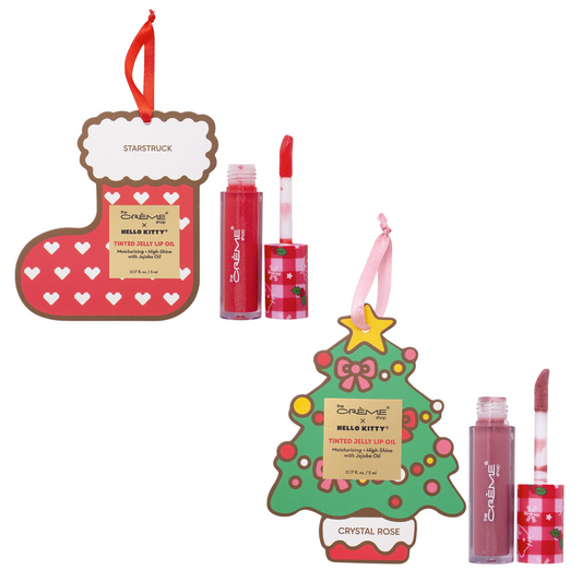 Two FASHION GO Hello Kitty Tinted Jelly Lip Oils in red and pink come in festive packaging shaped like a stocking and Christmas tree.