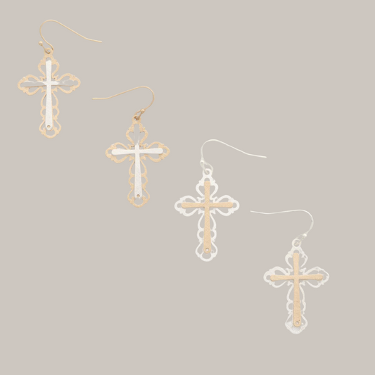 FASHION GO’s Two Tone Cross Dangle Earrings, featuring one gold and one silver pair, are displayed against a plain light background, emphasizing their elegant contrast.