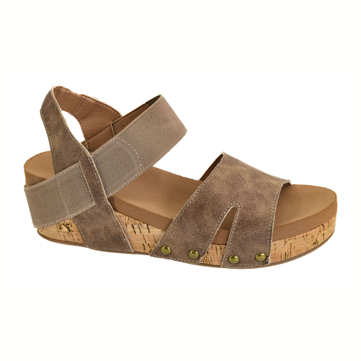 The Better with Time Wedge Sandal in Tan by CORKY'S FOOTWEAR INC features a cork wedge heel, two wide top straps, an ankle strap with hook-and-loop closure, metal rivet accents at the toe, and a comfy insole for all-day wear.