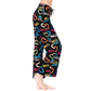 Person wearing FASHION GO Buttery Soft Pajama Pants with Drawstring in black, featuring multicolored heart and "LOVE" prints and an elastic waistband, standing barefoot against a white background.